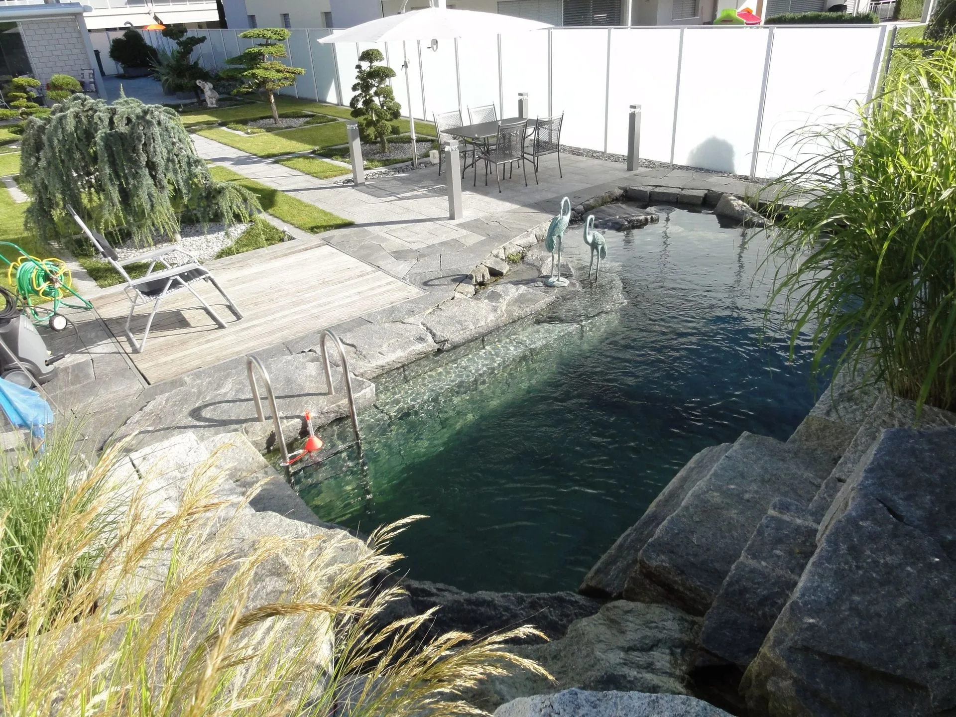 Kleinpeter Gartenbau AG seit über 90 Jahren Ihr Partner für Gartenbau - Gartenpflege - Steinarbeiten - Teich- und Poolbau